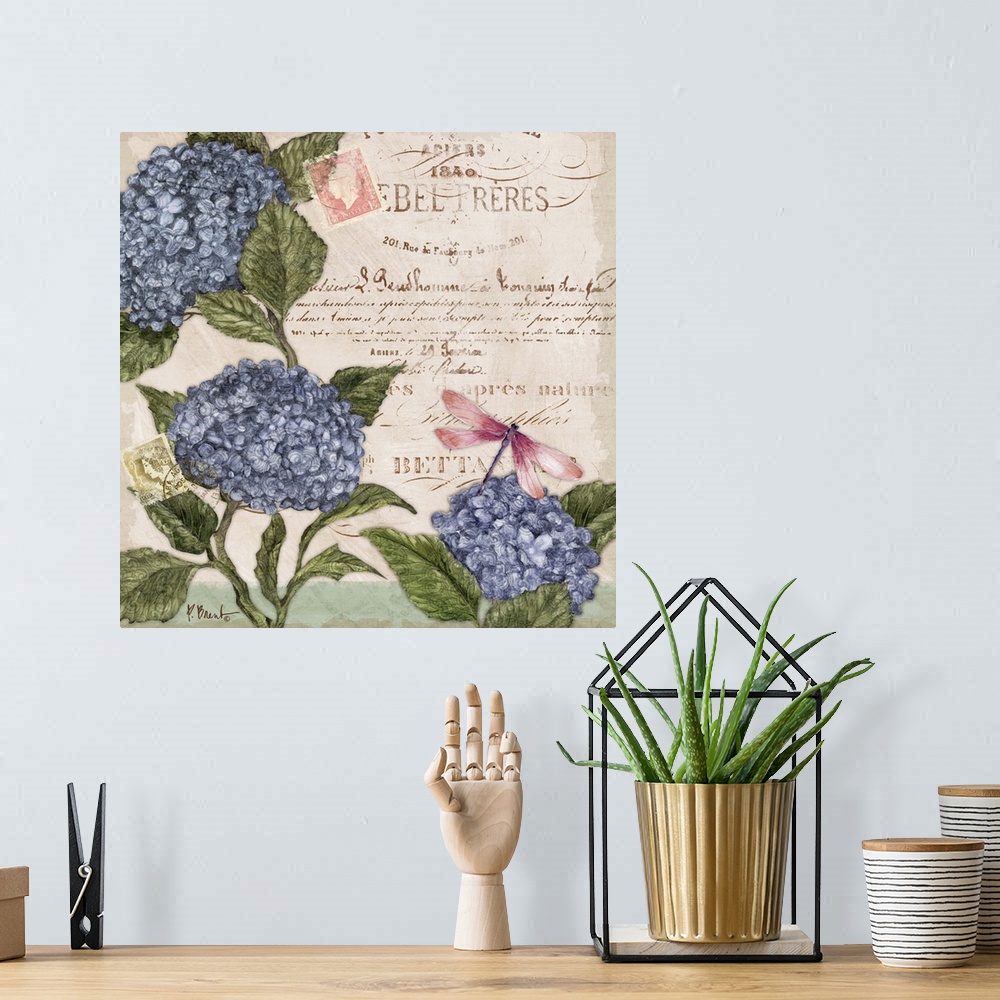 A bohemian room featuring Decorative mixed media panel featuring three hydrangea blooms, a vintage letter, and a dragonfly.