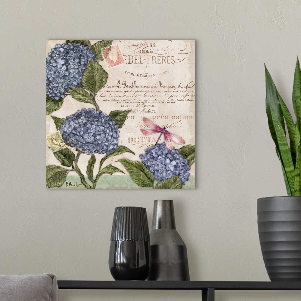A modern room featuring Decorative mixed media panel featuring three hydrangea blooms, a vintage letter, and a dragonfly.