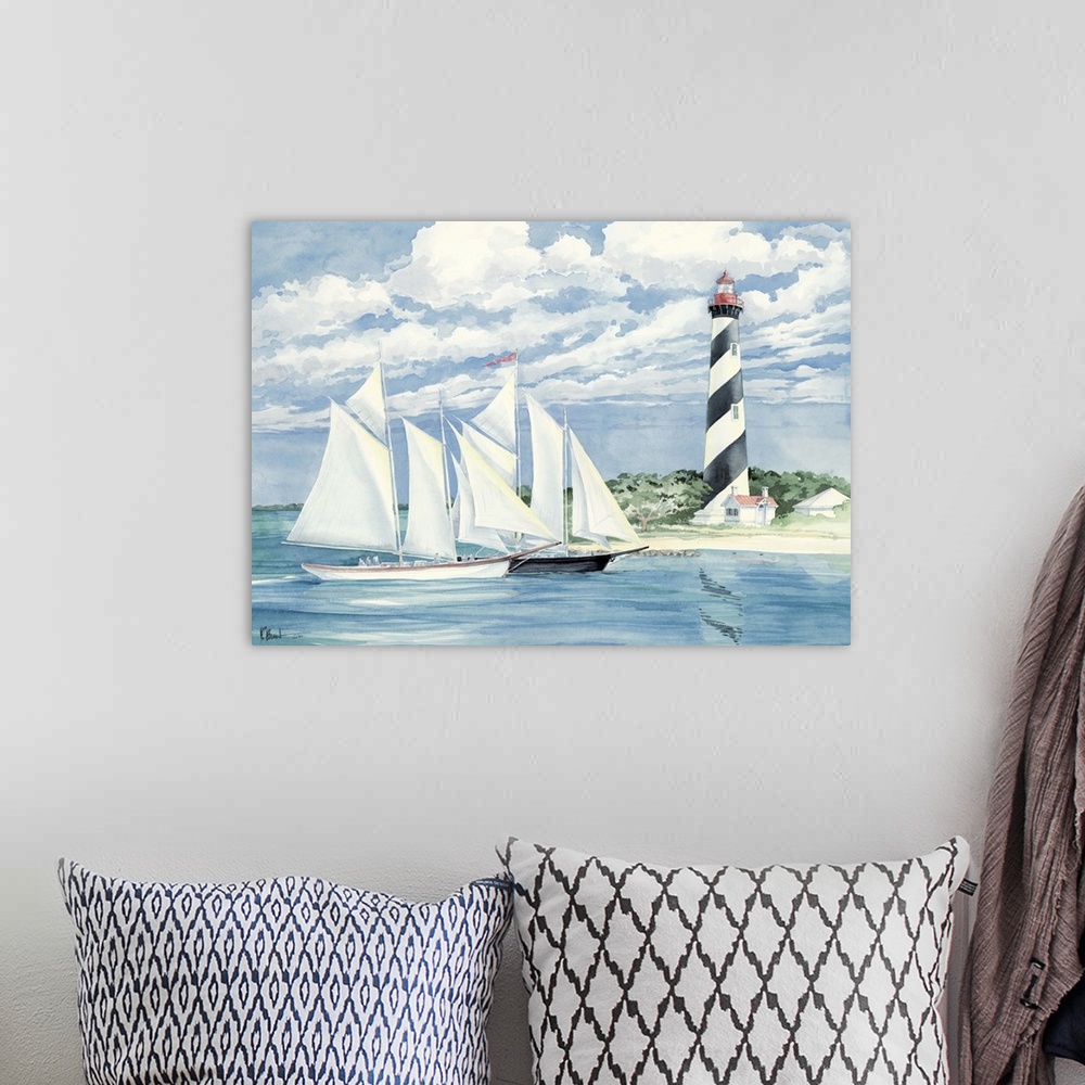 A bohemian room featuring Two boats with full sails passing by the St. Augustine Light in Florida.