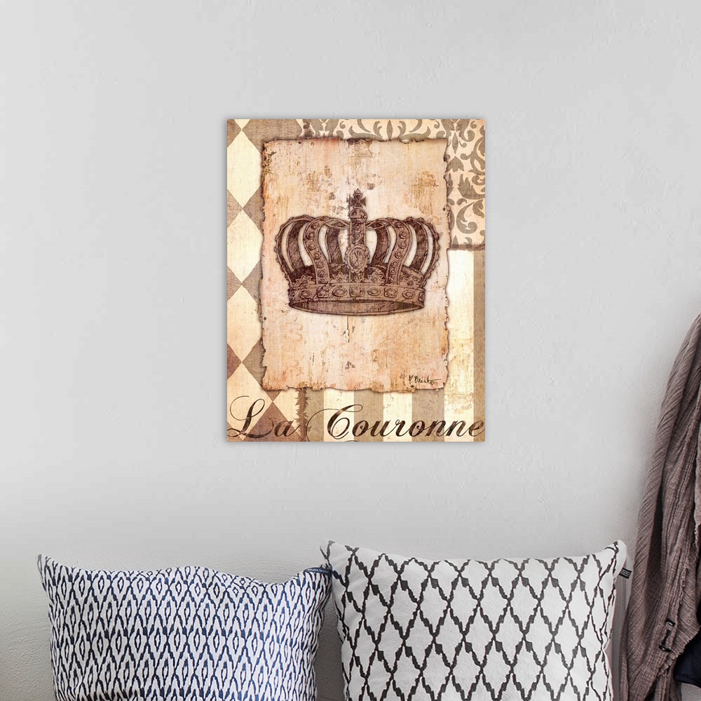 A bohemian room featuring Decorative sepia-toned artwork of a crown with vintage patterns.