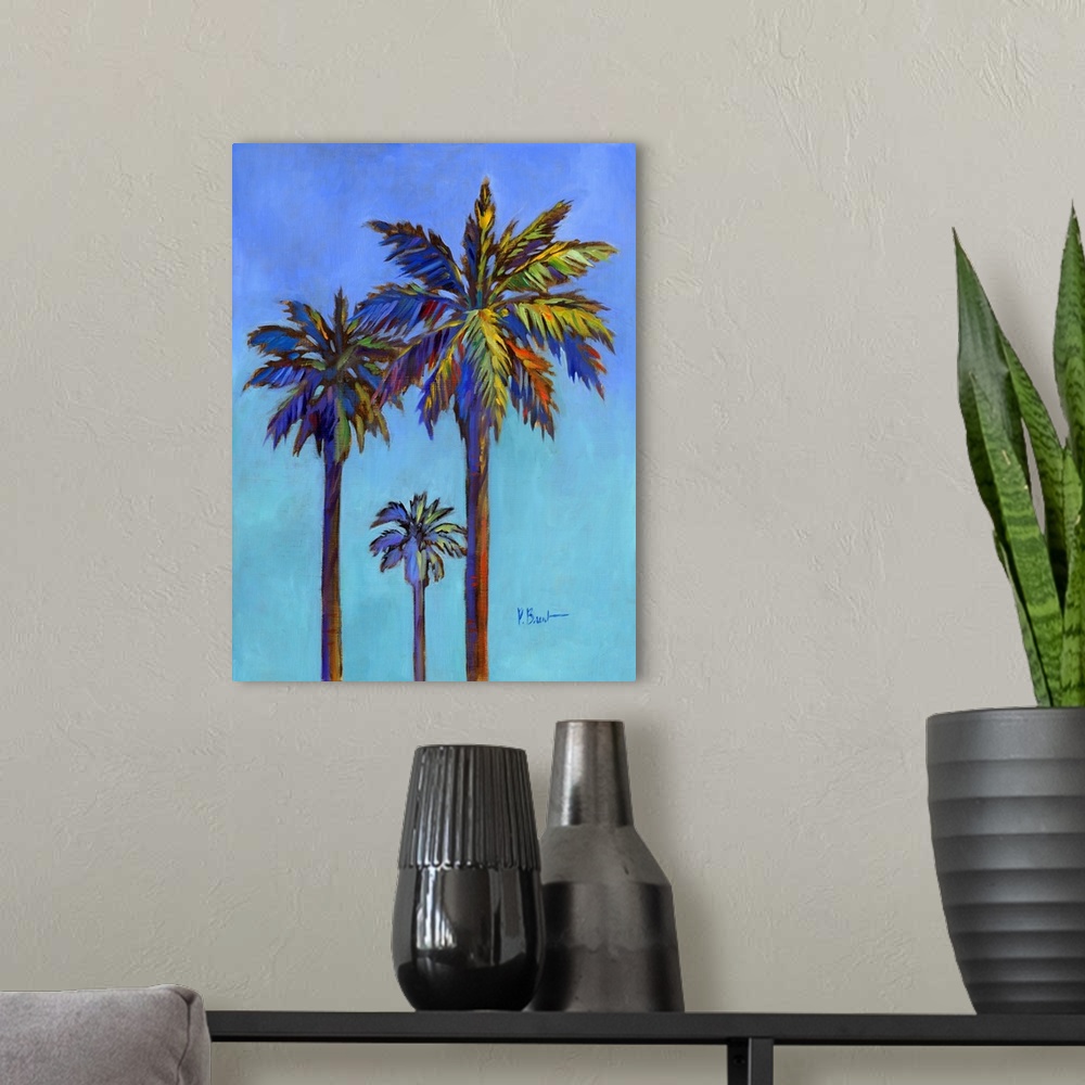 A modern room featuring Contemporary painting of three palm trees against a bold blue sky.