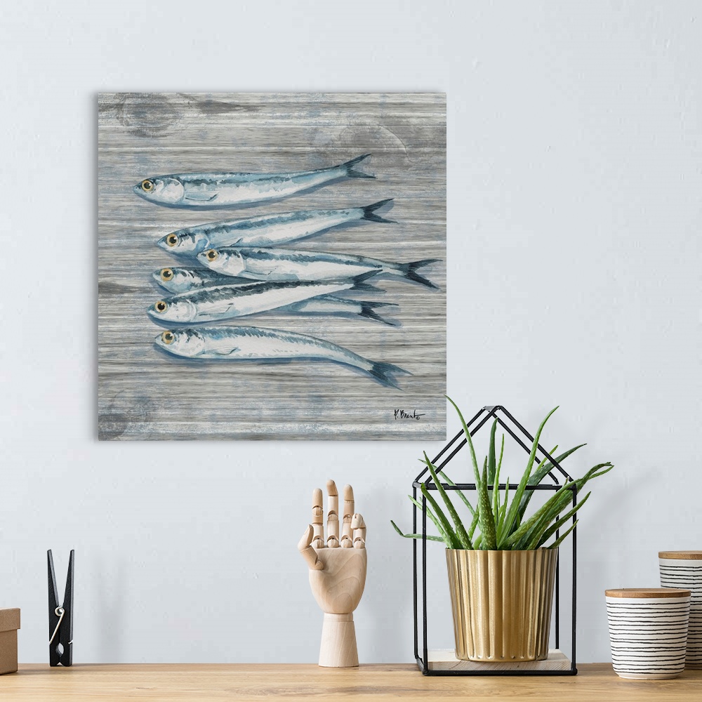 A bohemian room featuring Watercolor painting of sardines on a wooden background.