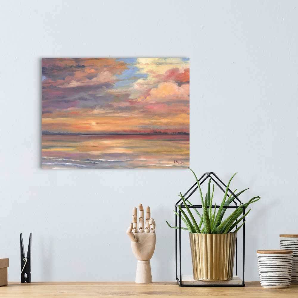 A bohemian room featuring Contemporary painting of the sunset over the ocean.