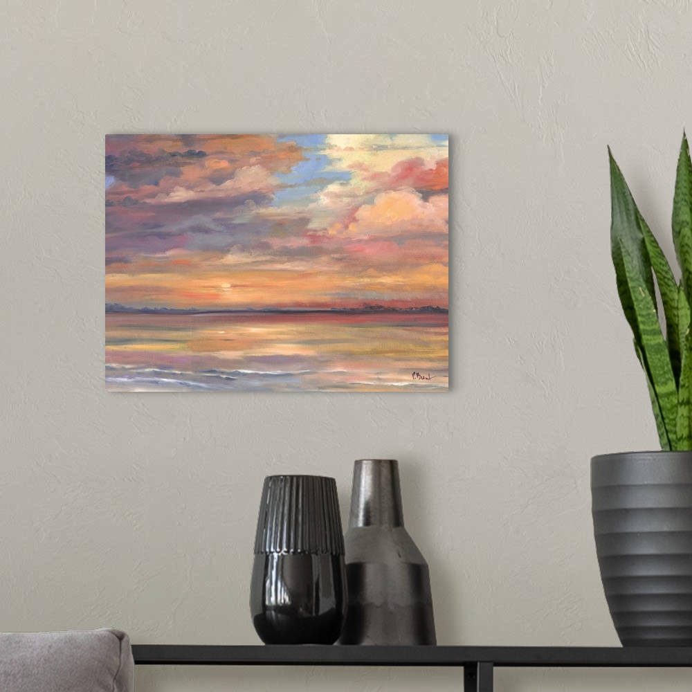 A modern room featuring Contemporary painting of the sunset over the ocean.