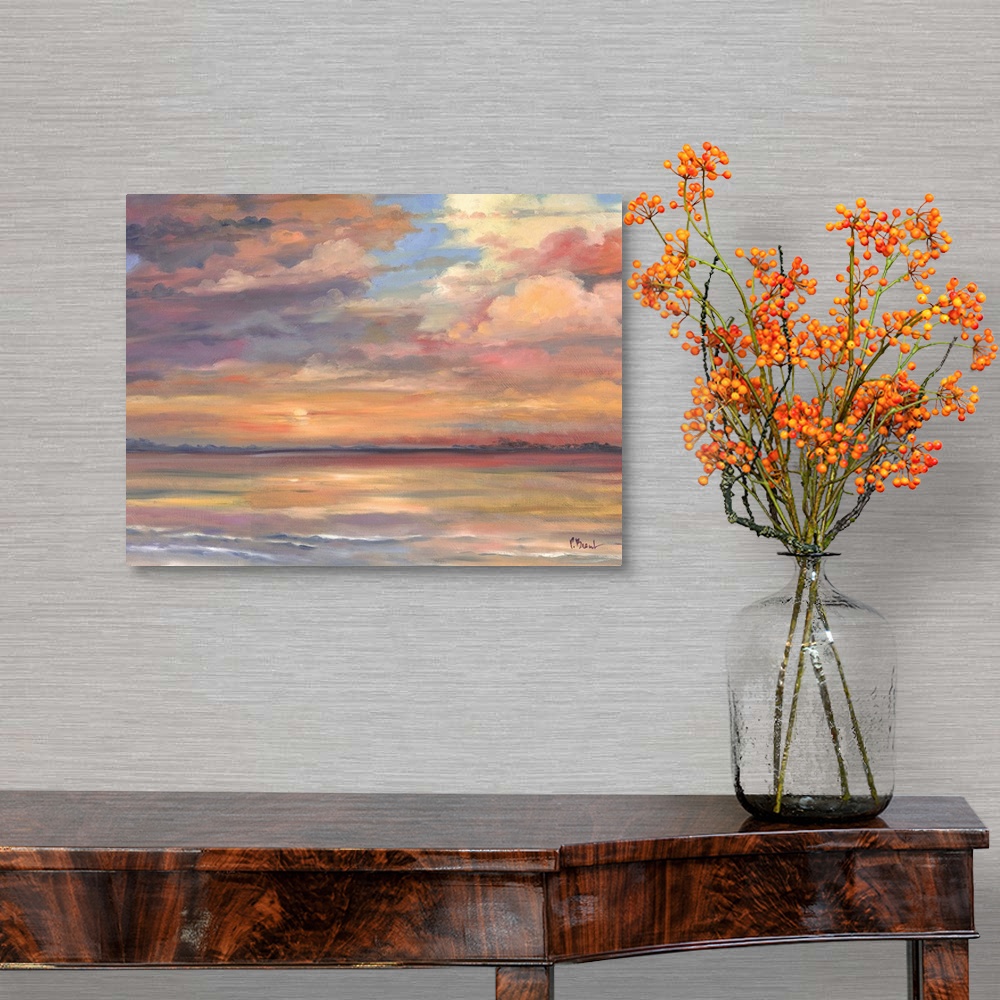 A traditional room featuring Contemporary painting of the sunset over the ocean.