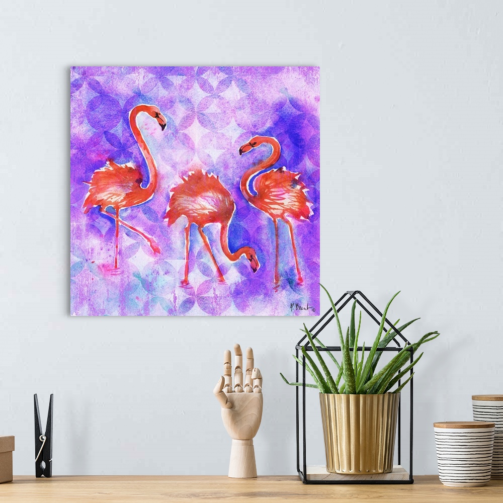 A bohemian room featuring Square watercolor painting of three flamingos on a purple and pink patterned background.