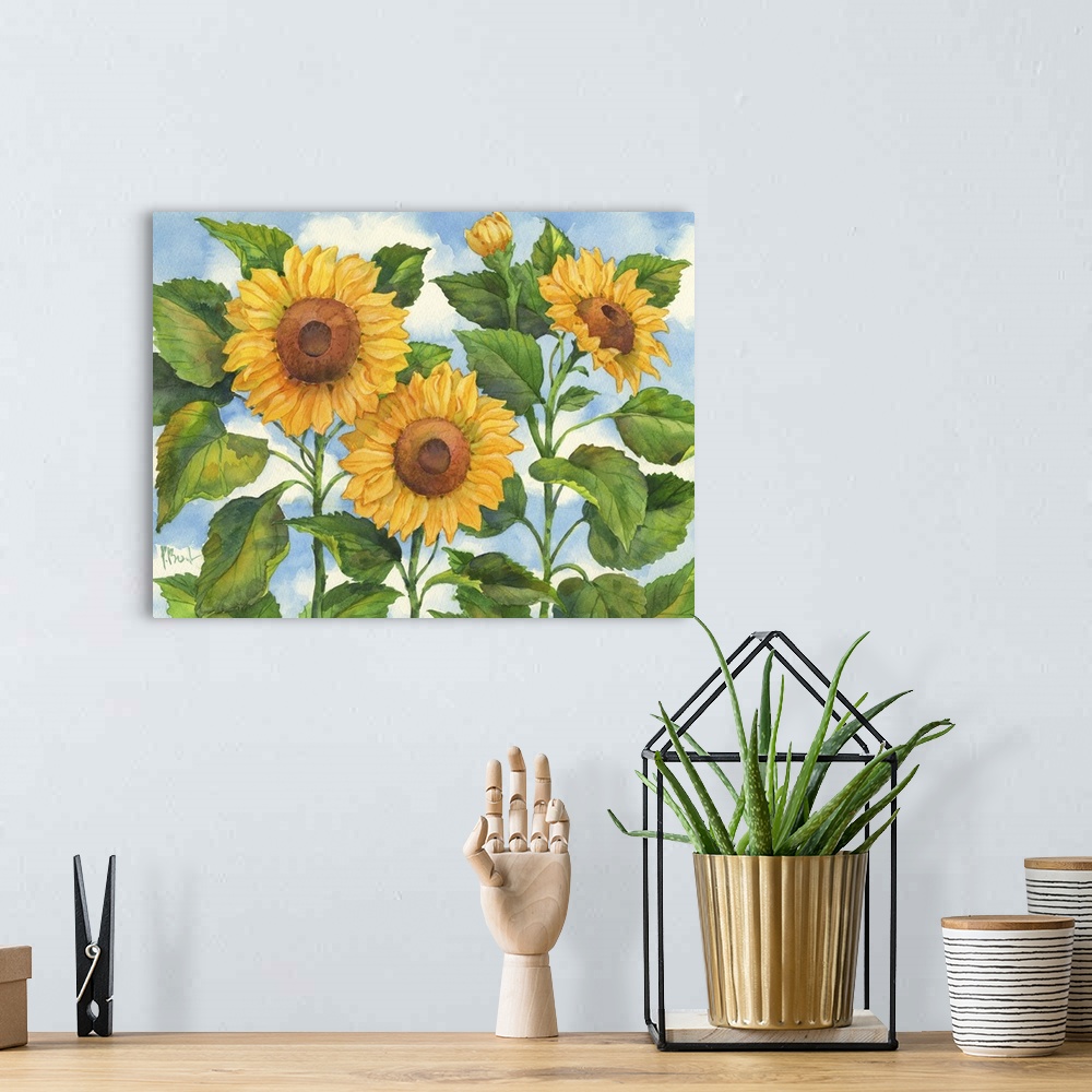 A bohemian room featuring Trio of sunflowers with broad leaves against the sky.