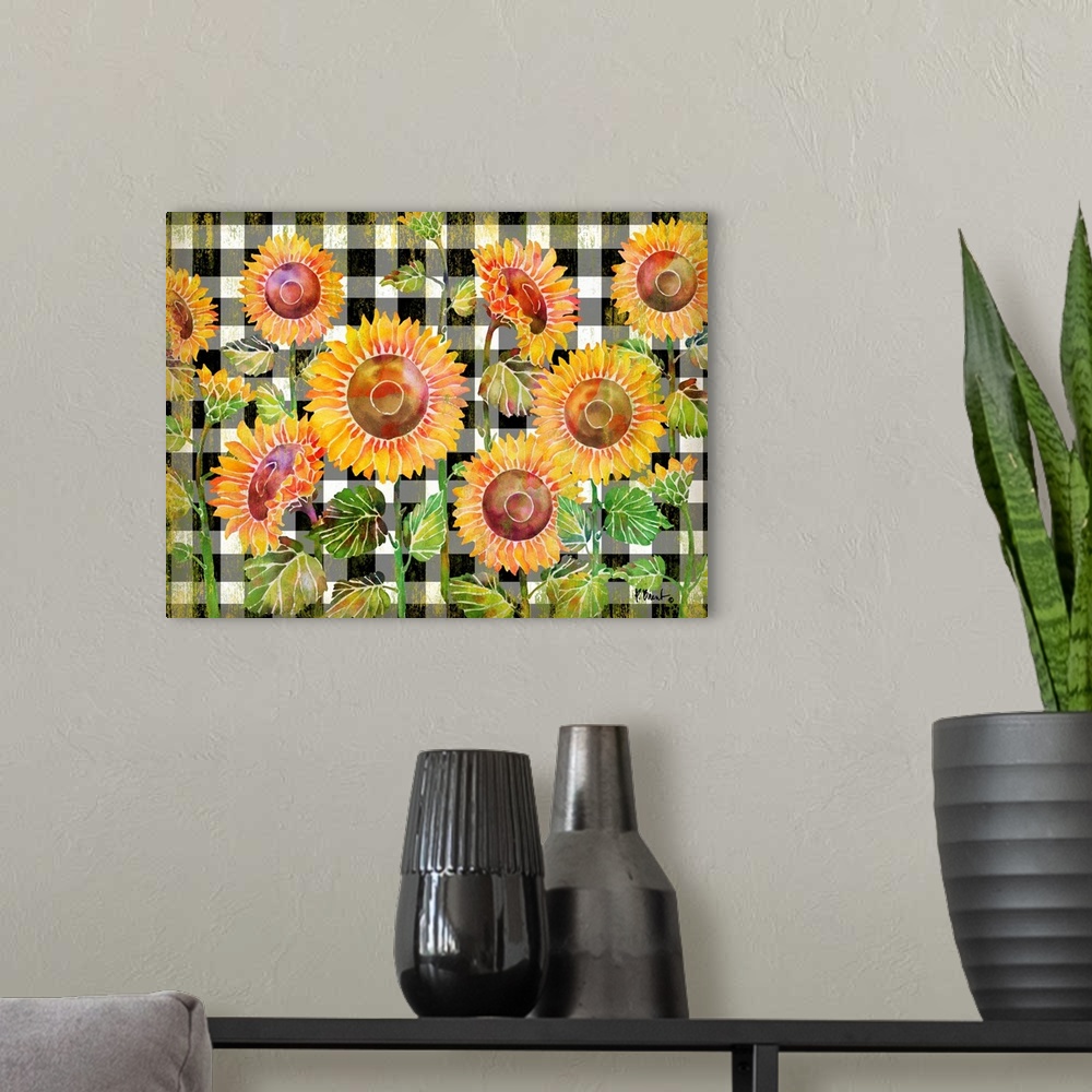 A modern room featuring Watercolor artwork of sunflowers on a black and white checked background.