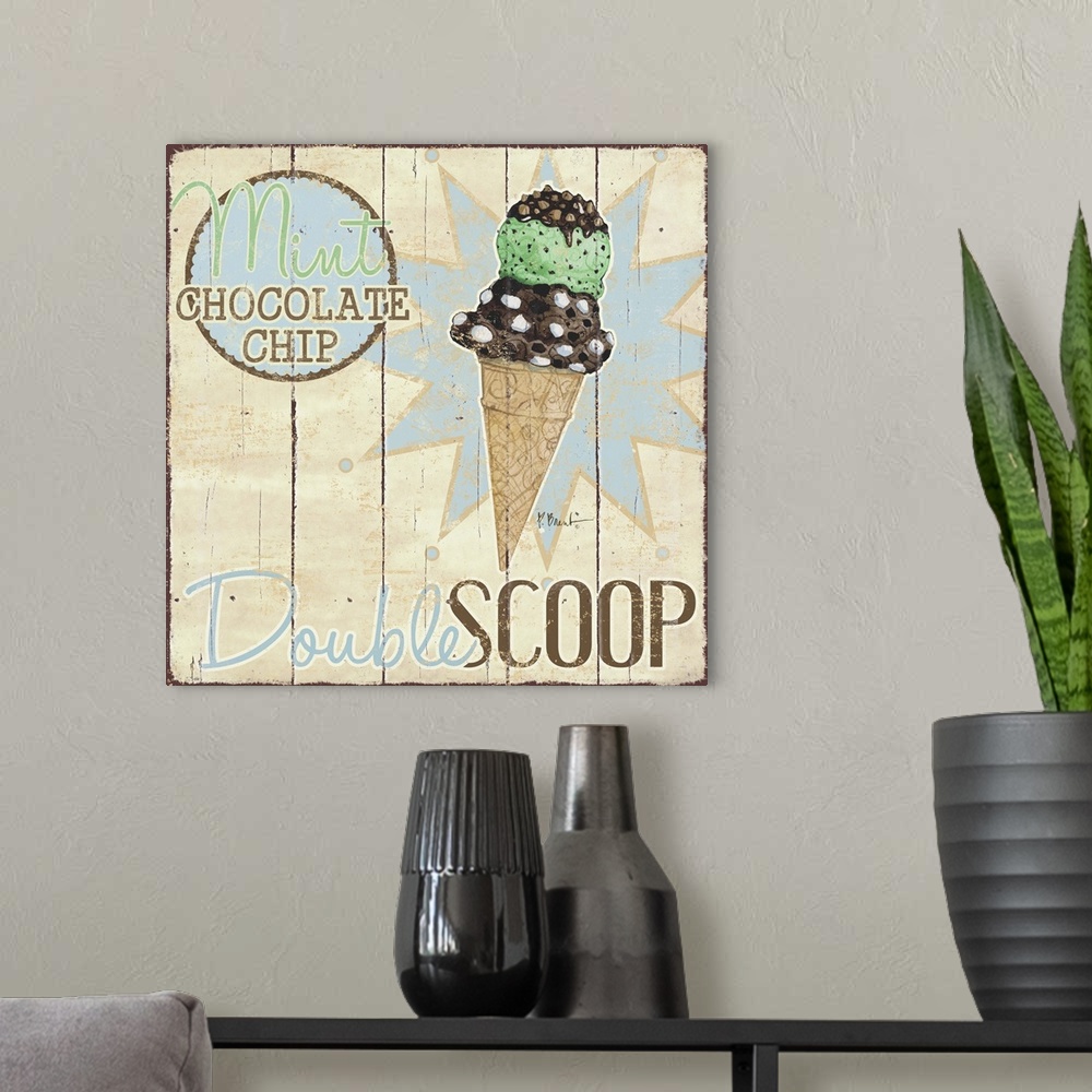 A modern room featuring A vintage ice cream shop sign featuring a double scoop on a cone.