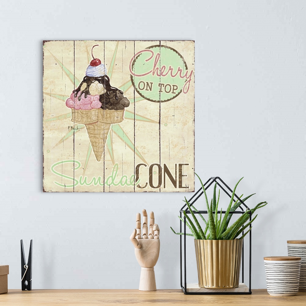 A bohemian room featuring A vintage ice cream shop sign featuring a sundae cone.