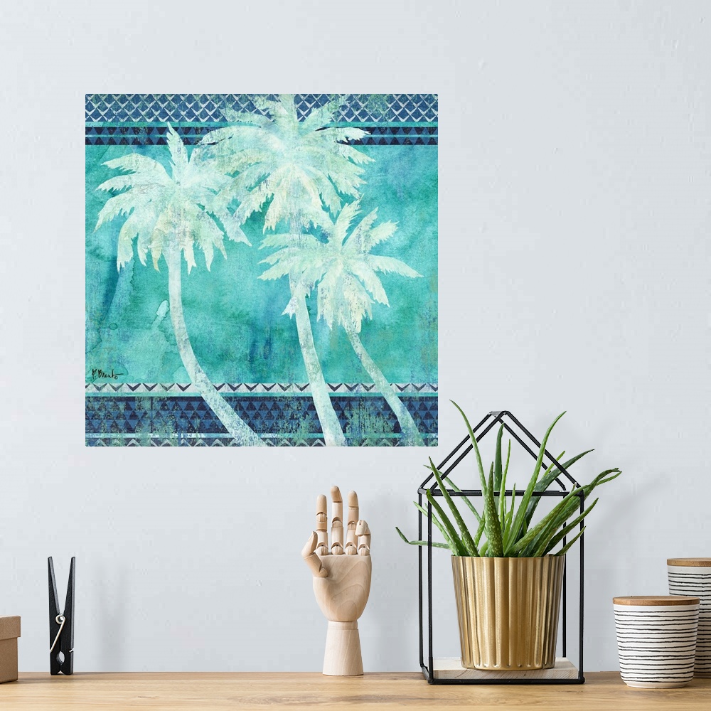 A bohemian room featuring Square decor with three silhouetted palm trees on a patterned background made in shades of blue.