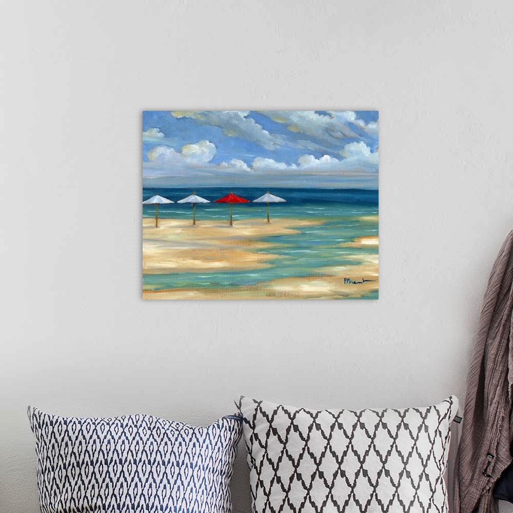 A bohemian room featuring Seascape with a sandy beach and four umbrellas under a cloudy sky.