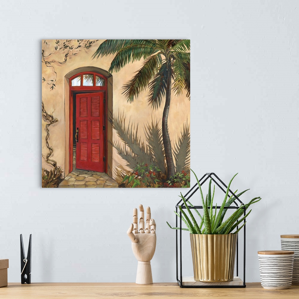 A bohemian room featuring Painting of a red door in an adobe building with a palm tree.