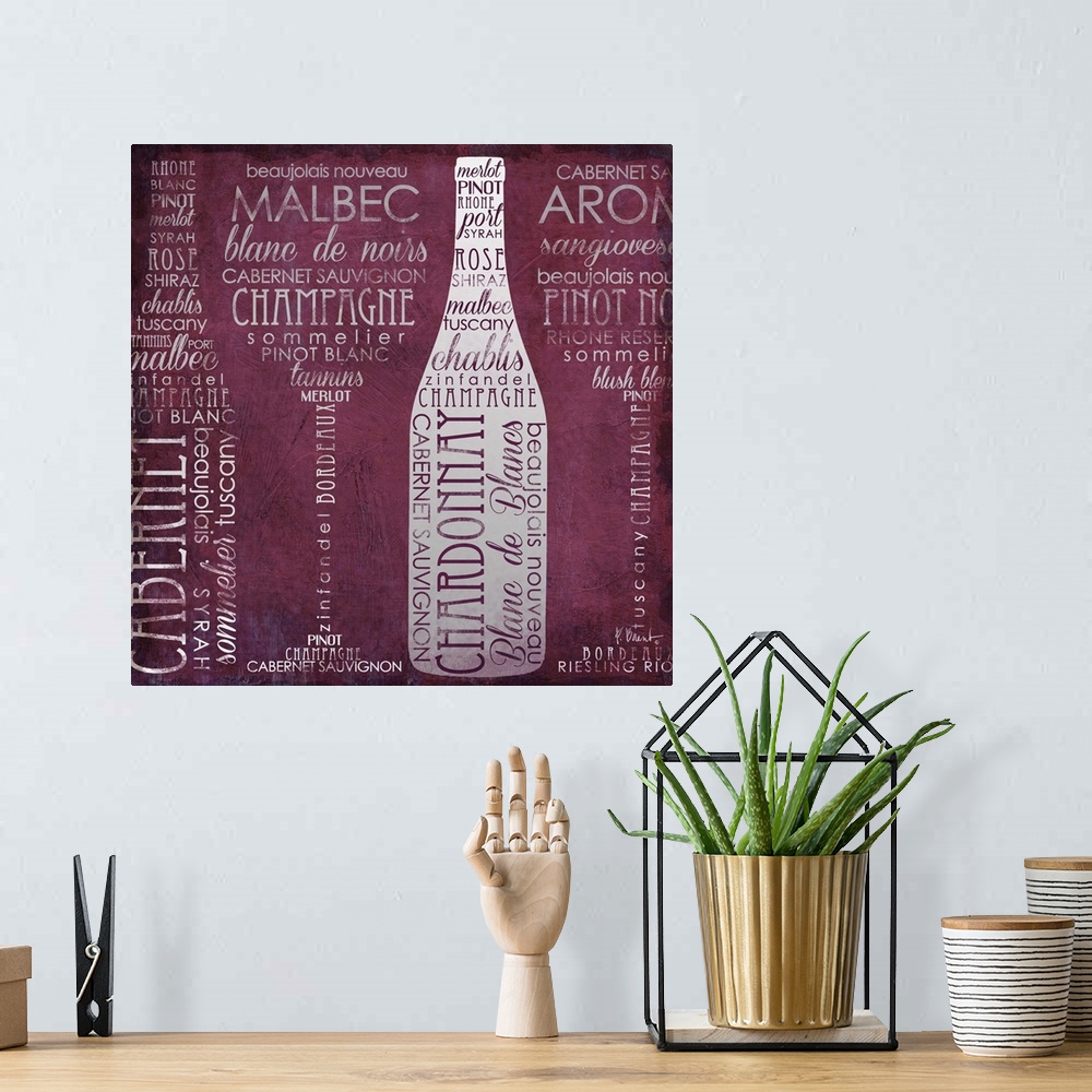 A bohemian room featuring Typography artwork of wine-themed words arranged to from wine bottles and glasses.