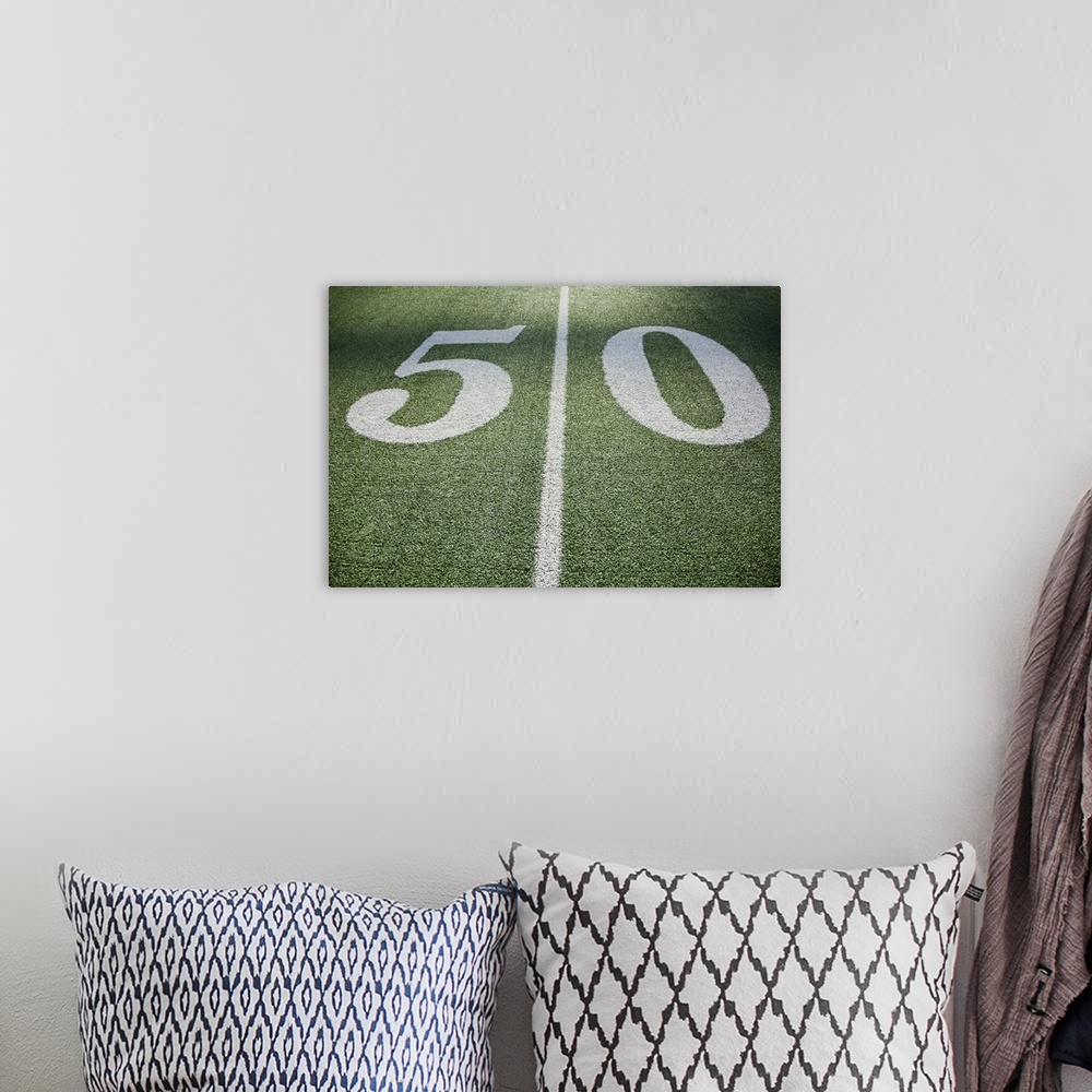 A bohemian room featuring 50 yard line marker in American Football stadium