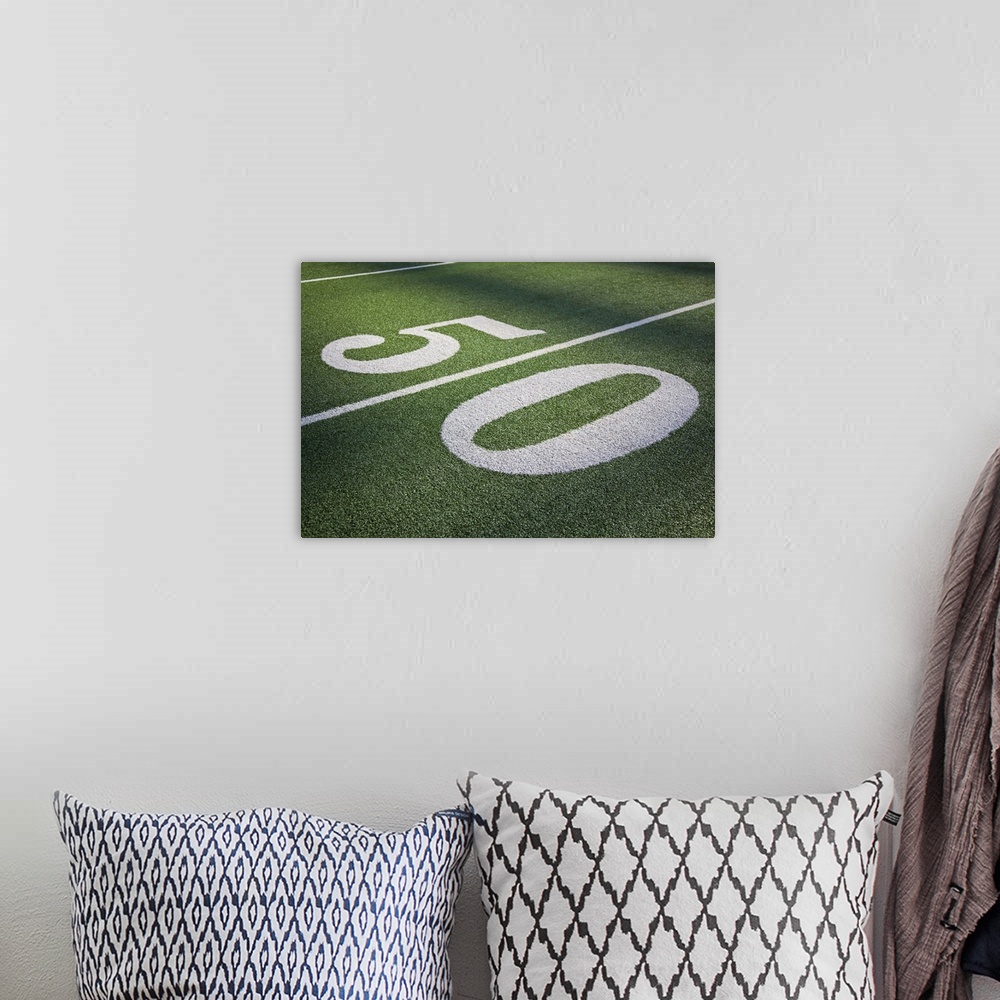 A bohemian room featuring 50 yard line marker in American Football stadium