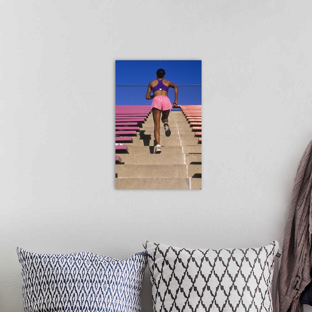 A bohemian room featuring Athletic woman running up stairs