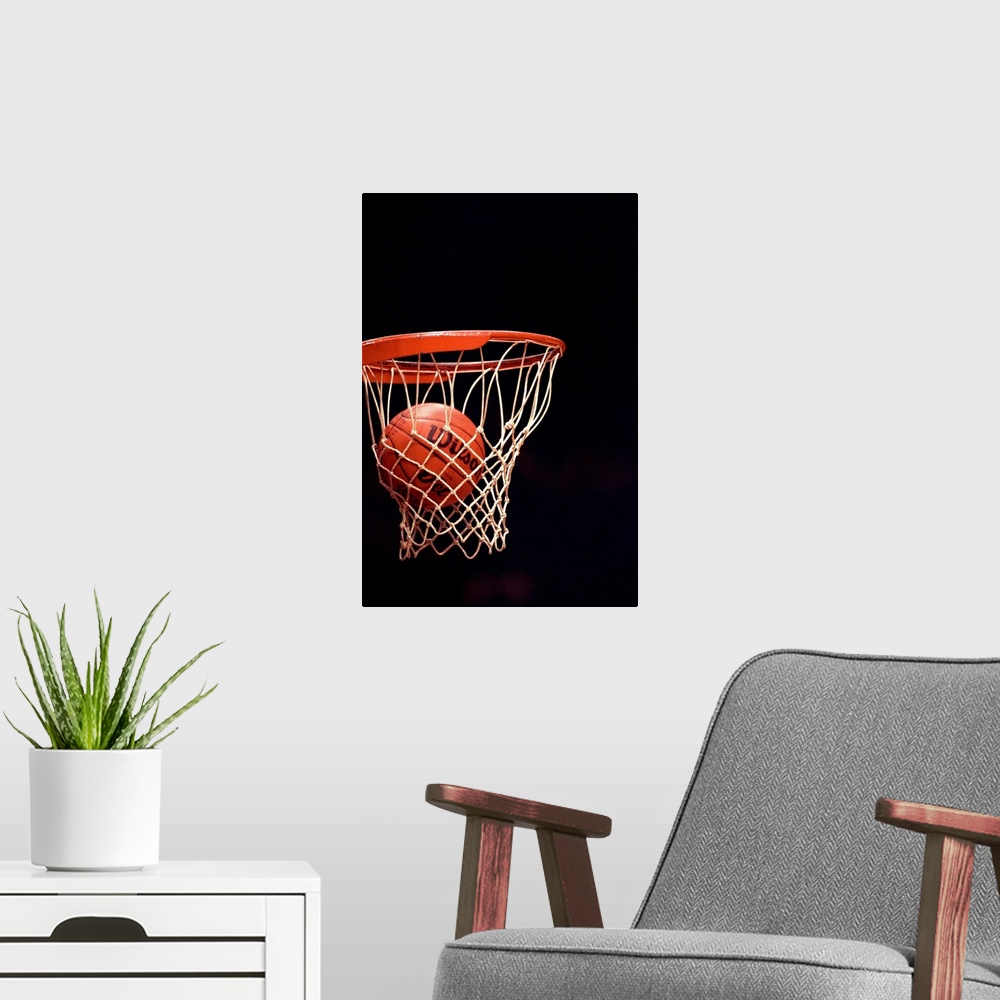 A modern room featuring Basketball going through the hoop