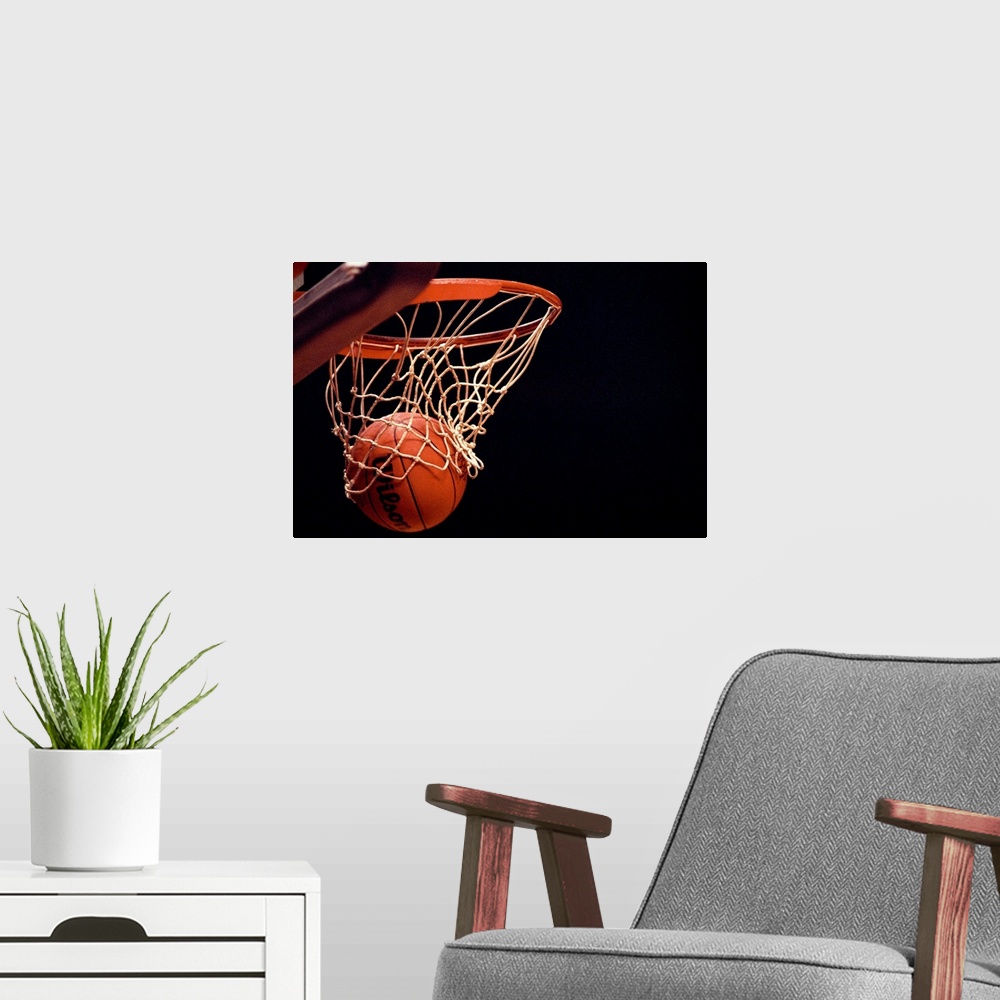 A modern room featuring Basketball going through the hoop