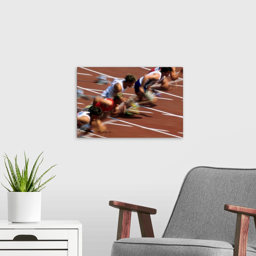 A modern room featuring Blurred action of men's 100 meter sprint race.