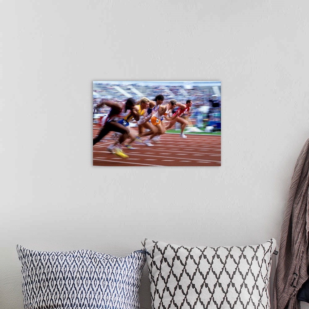 A bohemian room featuring Blurred action of men's 100 meter sprint race