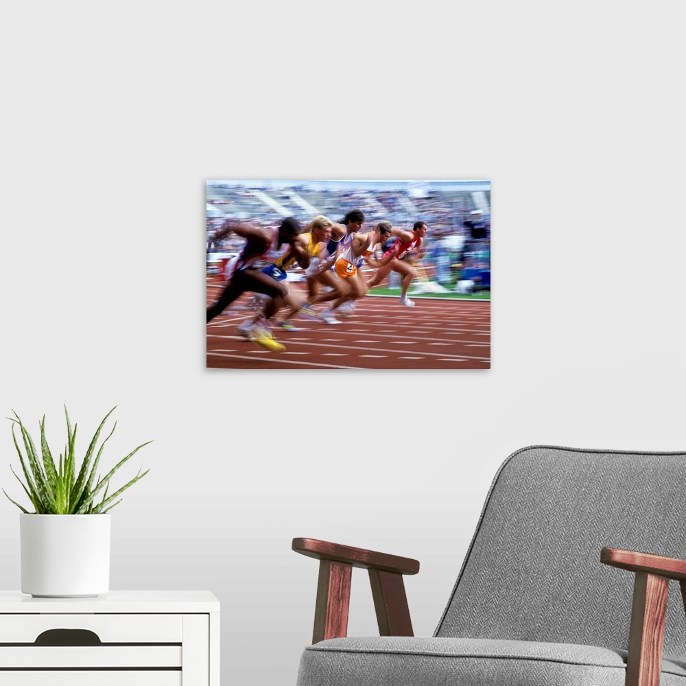 A modern room featuring Blurred action of men's 100 meter sprint race