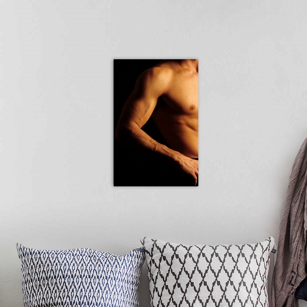 A bohemian room featuring Detail of male's arm and torso