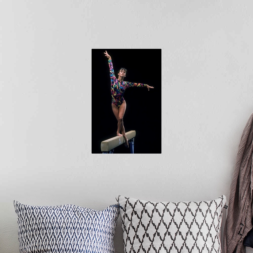 A bohemian room featuring Female gymnast on the balance beam