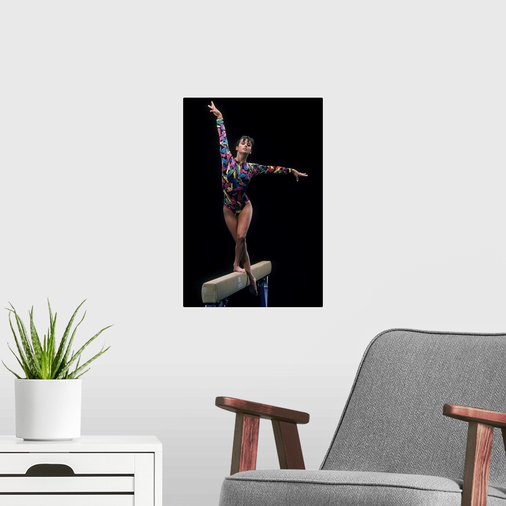 A modern room featuring Female gymnast on the balance beam