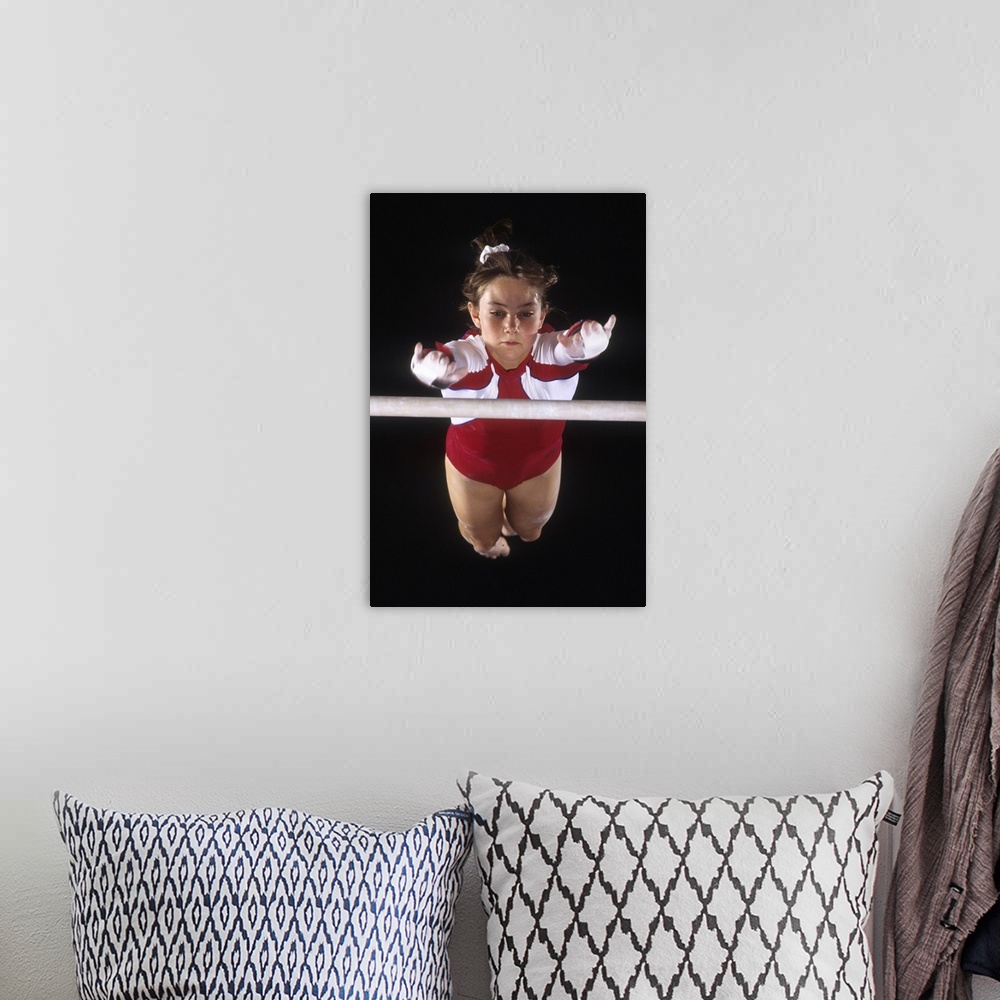 A bohemian room featuring Female gymnast on the uneven bars