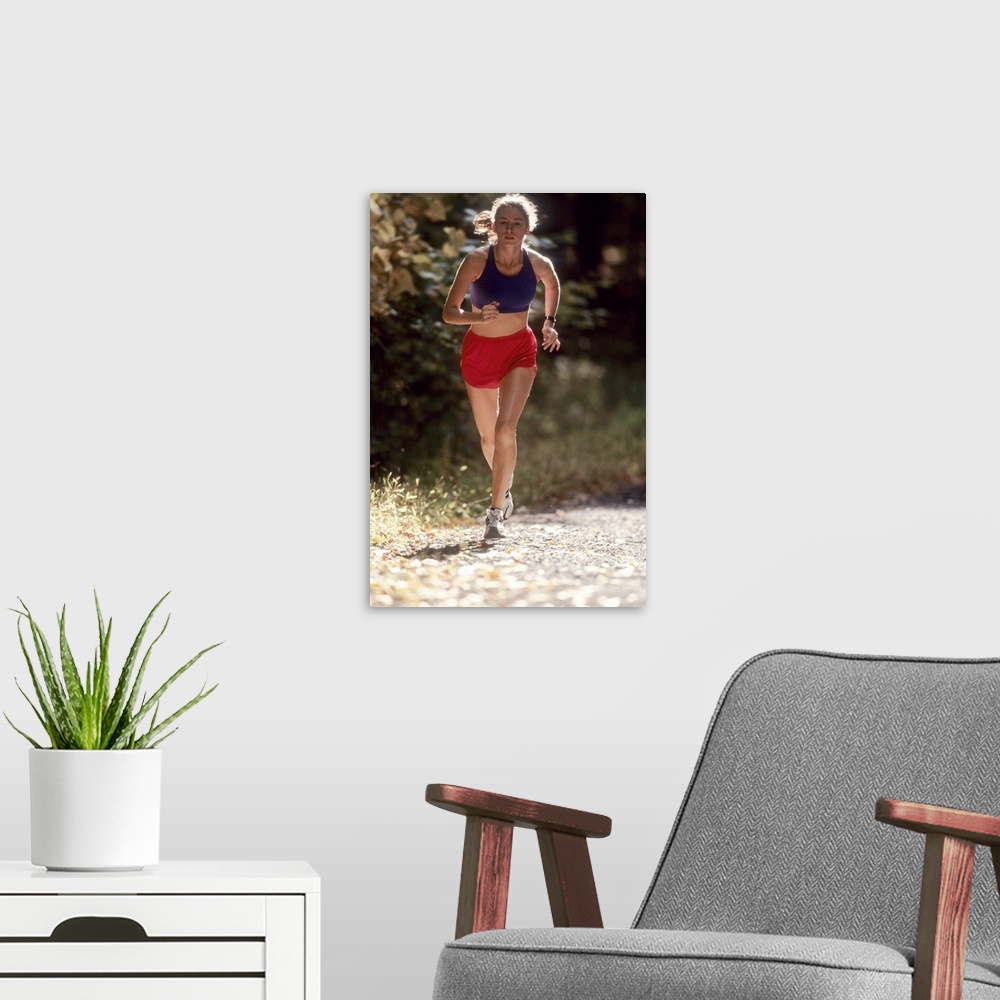 A modern room featuring Female runner out on the trails