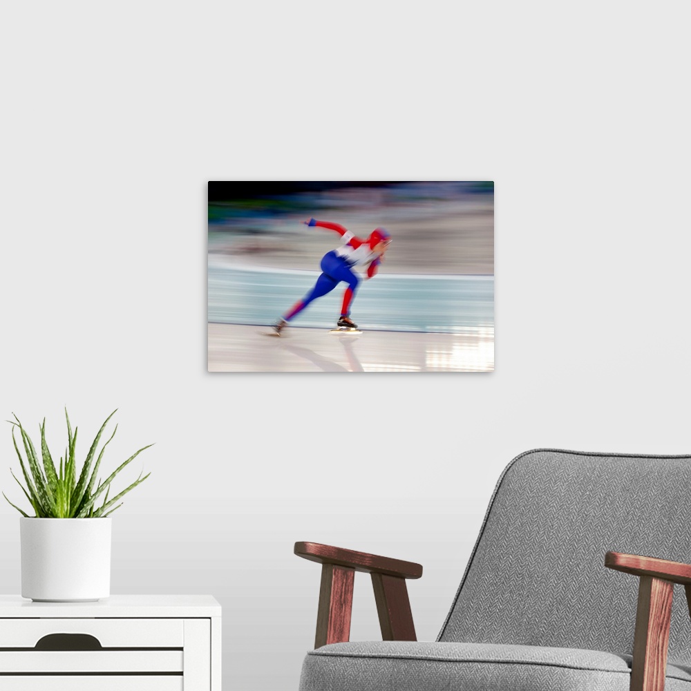 A modern room featuring Female speed skating in action