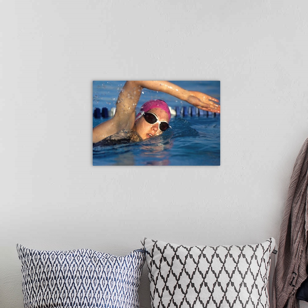 A bohemian room featuring Female swimmer in action