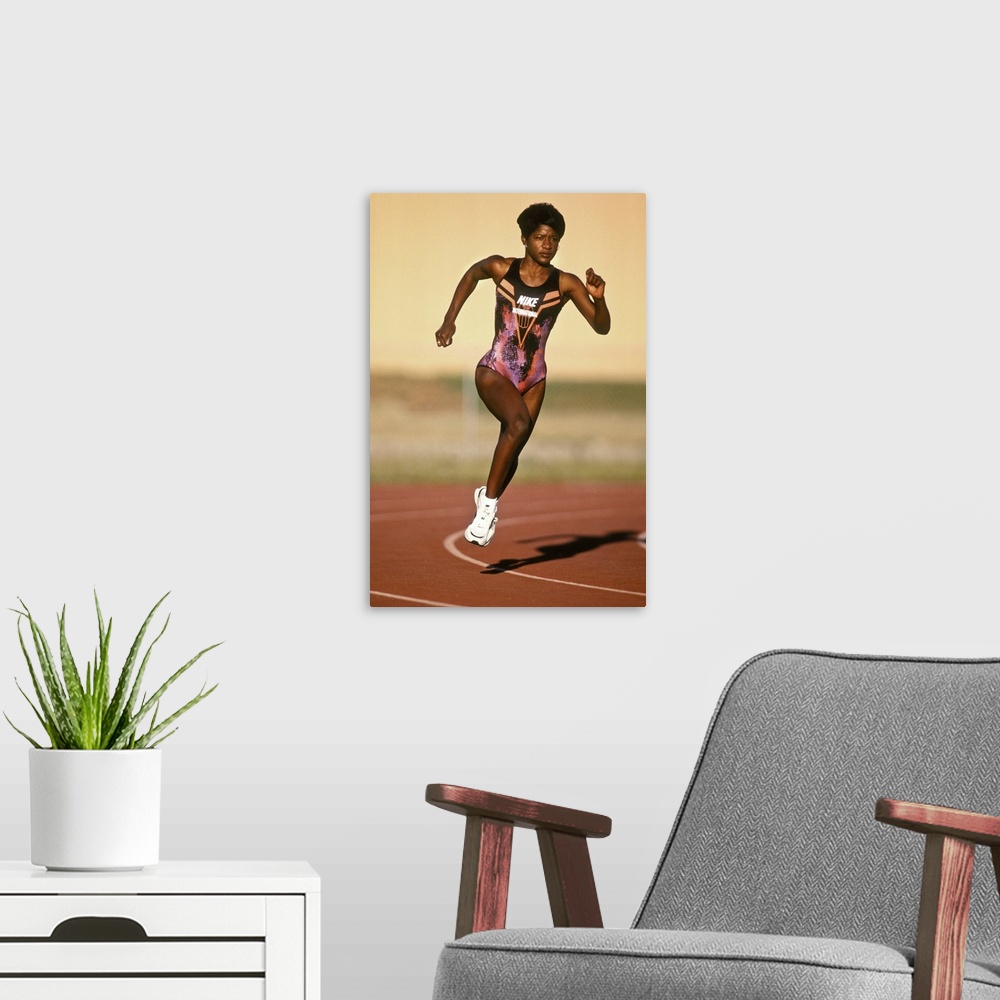 A modern room featuring Female track and field athlete in action
