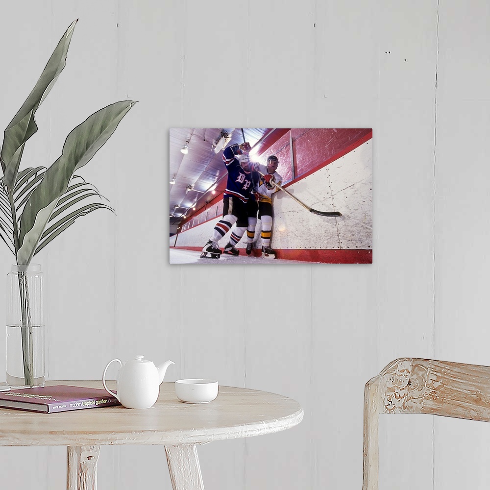 A farmhouse room featuring Ice hockey players checking