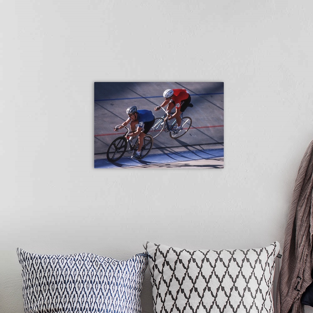 A bohemian room featuring Male cyclists competing on the velodrome
