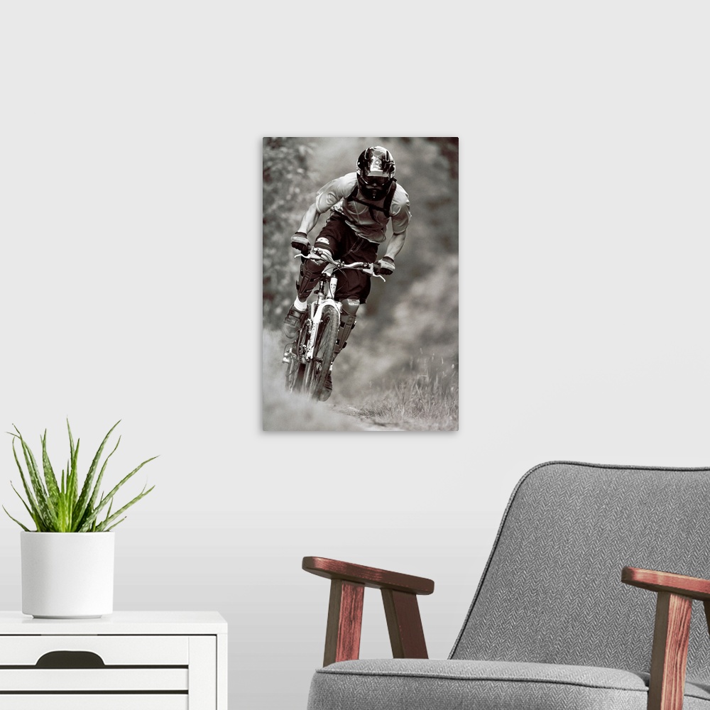 A modern room featuring Male mountain biker on the trails
