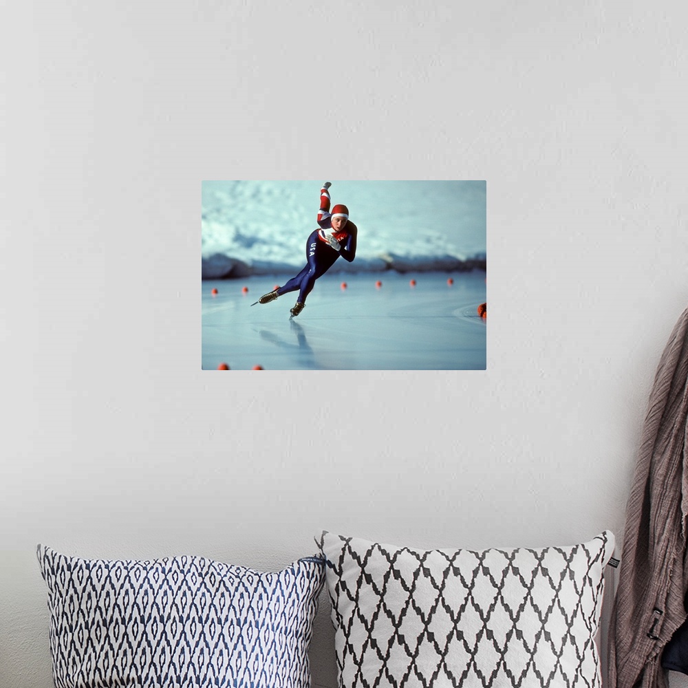 A bohemian room featuring Male speed skater in action