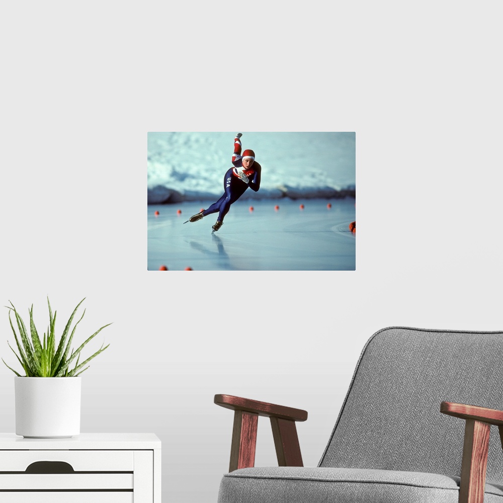 A modern room featuring Male speed skater in action
