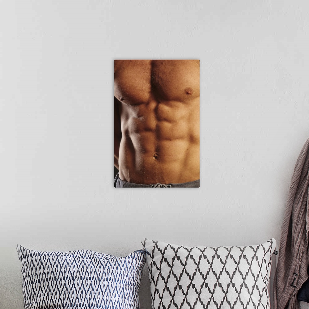 A bohemian room featuring Man's torso.