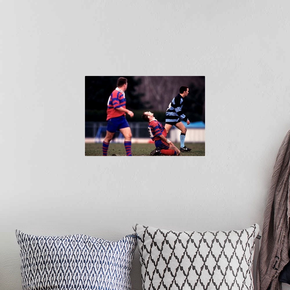 A bohemian room featuring Rugby match action