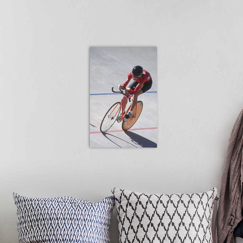 A bohemian room featuring Woman cyclist competing on the velodrome