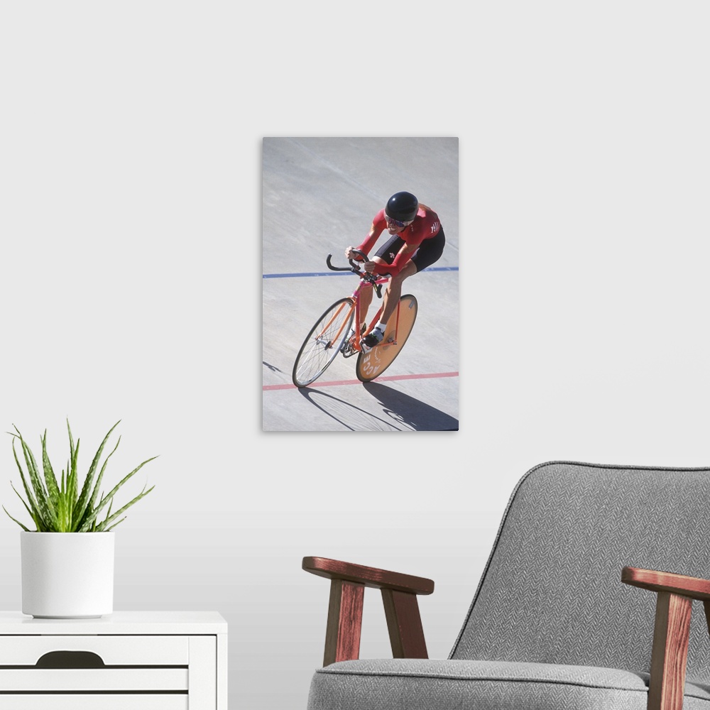 A modern room featuring Woman cyclist competing on the velodrome