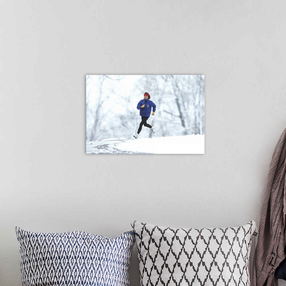 A bohemian room featuring Woman running outdoors in snowy weather