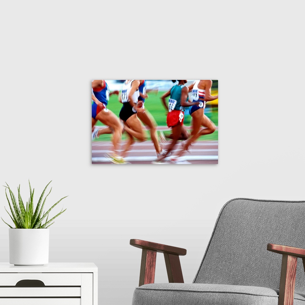 A modern room featuring Women's track and field race