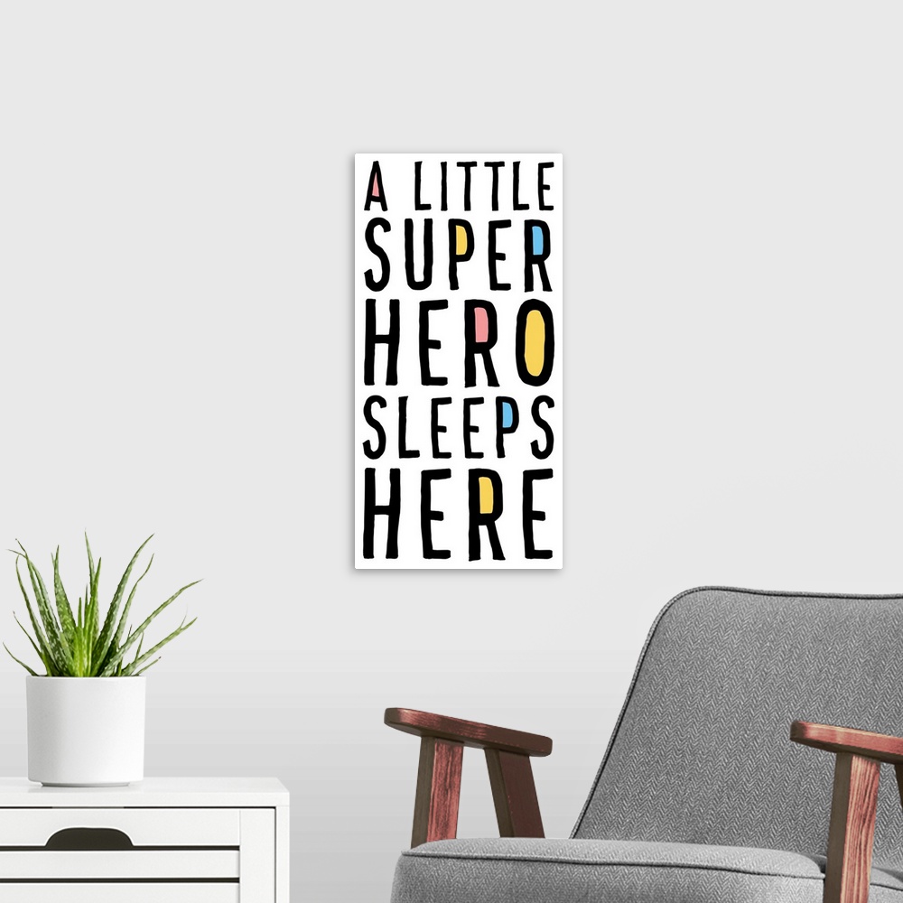 A modern room featuring A Little Superhero Sleeps Here