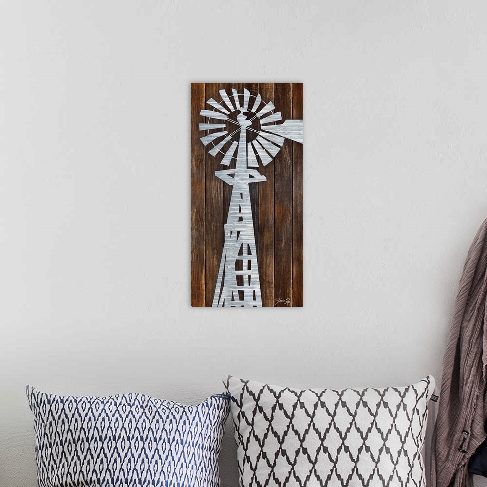 A bohemian room featuring A metal windmill design against a wood plank wall.