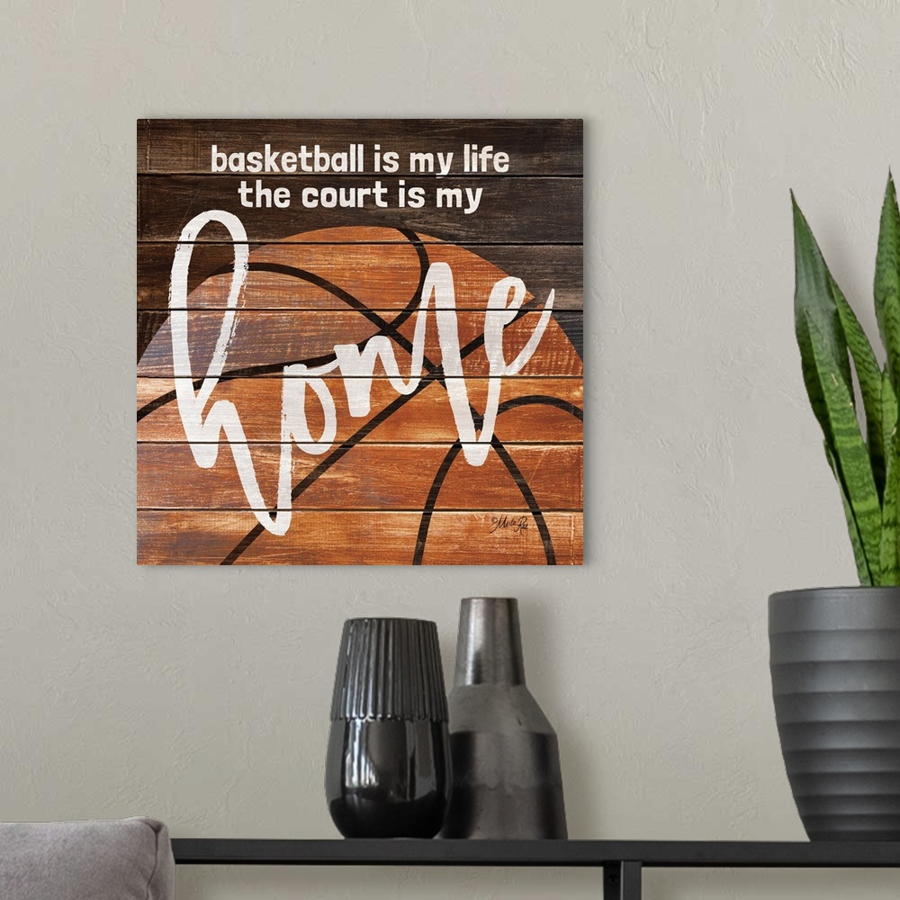 A modern room featuring Basketball themed typography art on a wooden board background.