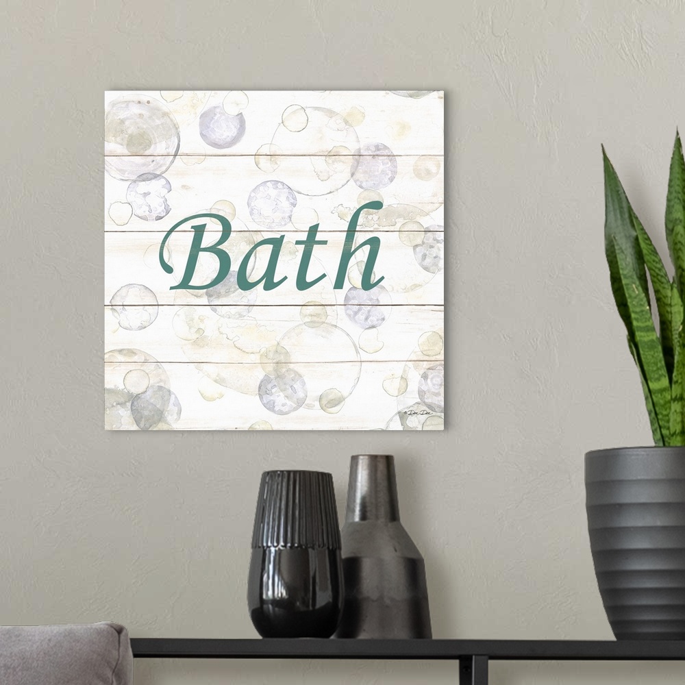 A modern room featuring The word "Bath" surrounded by bubbles on a light background with a wooden effect.