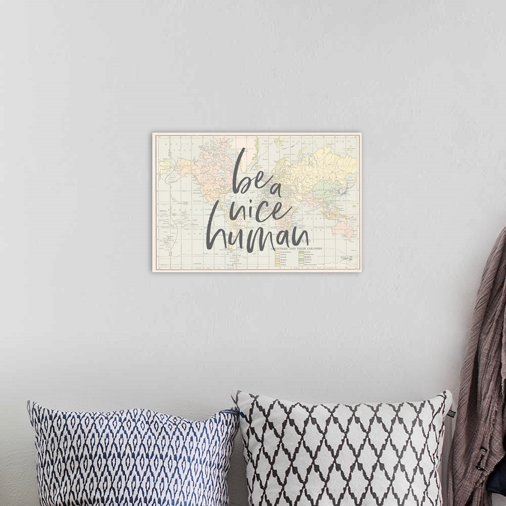 A bohemian room featuring Be a Nice Human Map